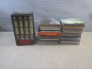 (BR3) Assorted CDs and Johnny Carson VHS Set