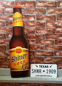 Shiner Bock bottle and license plate, tin tackers  metal signs