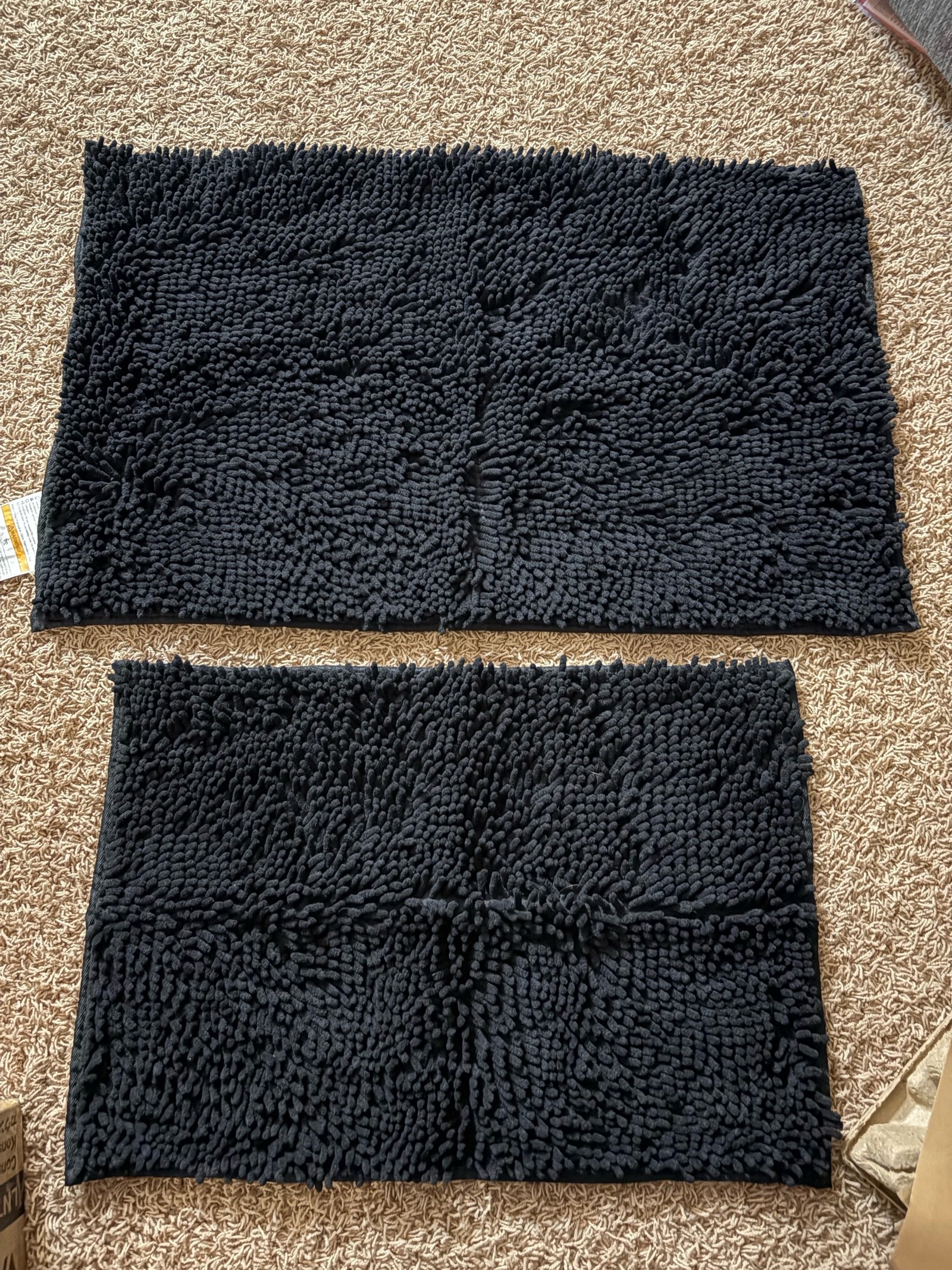 Two Black Bath Mats, Very soft and comfortable 32 x 20 and smaller mat is 24 x 16