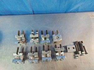 Set of adjustable coil spring spacers or mini spring compressors used for adjusting vehicle suspension height