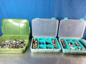 Plastic storage organizers full of parts