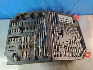 Multi-piece drill and drive bit set housed in a black plastic molded carrying case.