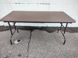 Brown wood-grain laminate or melamine rectangular folding banquet table with steel folding legs