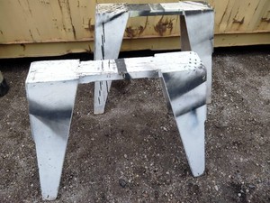 Heavy-duty wooden sawhorses, closely resembling the classic Burro Brand Contractor Sawhorse