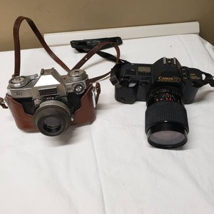 Zeiss Ikon Camera with Carl Zeiss Lens and Canon T70 Camera with Prospec MC Zoom Lens