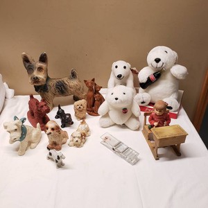 Vintage and Collectible Figurines Including Coca-Cola Bears, Teakwood Cats, and Various Dog Statues