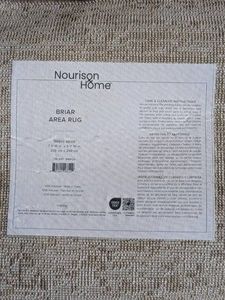 NOURISON HOME BRIAR AREA RUG BEIGE
