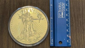Gold-Tone Walking Liberty-Style One Dollar Coin