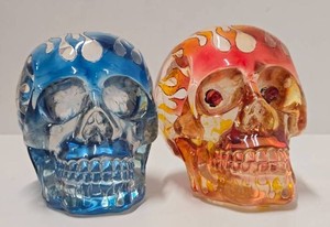 2 Signed Acrylic Flaming Skulls