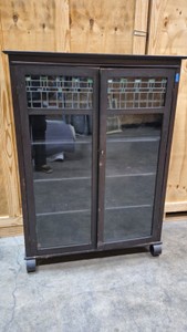 Mission-style double-door oak bookcase cabinet