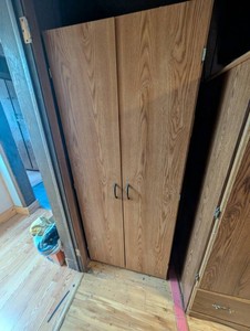 Woodgrain Double-Door Storage Cabinet With Shelving