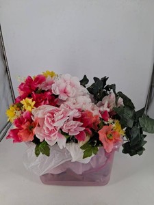 Artificial Floral Arrangement in Pink Container