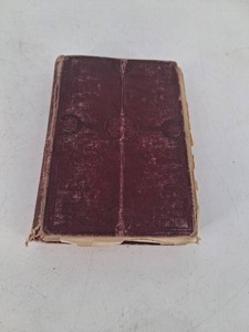 Hardcover Book With Handwritten Notes and Decorative Binding