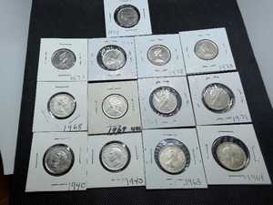 Thirteen Canadian Quarters Some Silver
