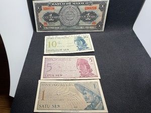 Four Foreign Bank Notes - Three Indonesian, One Mexican