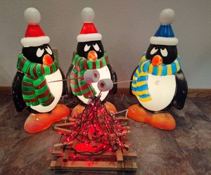 Winter Penguin Blowmolds Roasting Marshmallows Over a Fire
