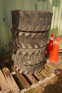 Set of 4 - Cat Brand Skid Loader Tires