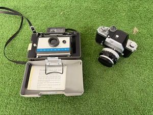 Polaroid Automatic 210 Land Camera & Nikon F Camera