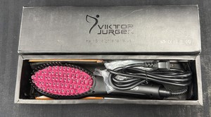 Brand New Viktor brand straightening hair brush.
