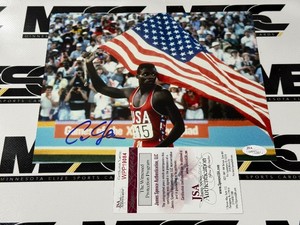 Carl Lewis Autograph Photo w JSA Authenticity