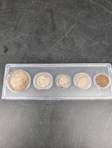 Whitman Holder With Five U.S. Coins