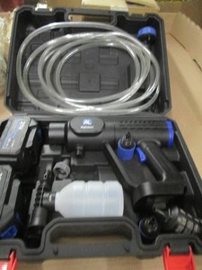 Aqlsaoci Cordless Pressure Washer kit packed inside a molded plastic carrying case. [1]