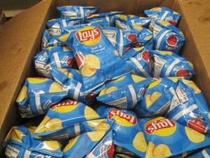 62 Bags Lays salt and vinegar chips dated Aug 25