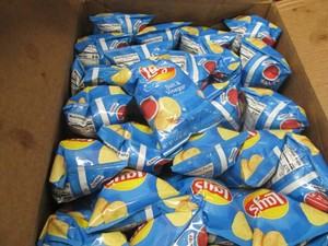 62 Bags Lays salt and vinegar chips dated Aug 25