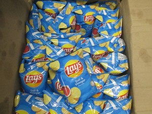 62 Bags Lays salt and vinegar chips dated Aug 25