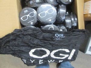 79 Mens OGI Eyewear branded size L in hockey puck compact packaging