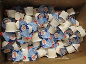 360 or so Coffee Mate French Vanilla creamers, one leaked and made a mess in the box