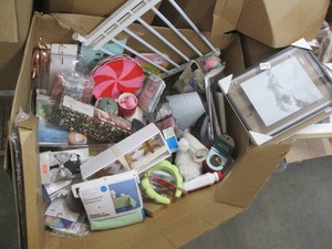 Box of clearance and damaged package items from a major retailer