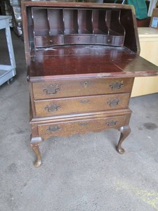 Antique mahogany pull down stationary desk
