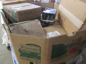 Pallet of assorted unopened packages of wall and floor tile and bricks
