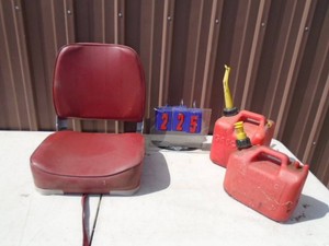 Boat seat & gas cans. As shown.