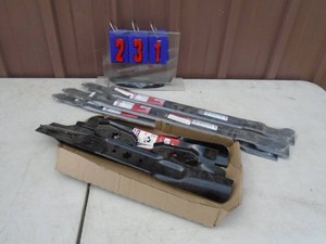 Assortment of lawn mower blades. As shown.