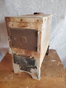Small Vintage Icehouse Wood Stove