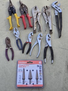 Titanium Step Drill Bits and Assorted Hand Tools including Pliers and Snips