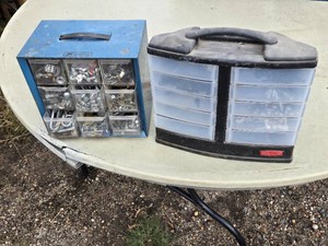 Lot of hardware organizers containing various screws, bolts, nuts, and washers