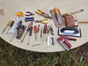 Lot of Hand Tools including Screwdrivers, Pliers, Paintbrush, Trowel, and Staple Gun