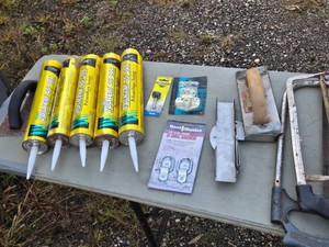 Tremco Vulkem 45 SSL and Tool Lot including Grinding Point, D-Ring Anchors, and Hacksaw
