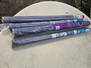 Lot of window screen rolls including BetterVue, Clear Advantage, Pet Screen, and Screen Repair, each measuring 36 in x 84 in.