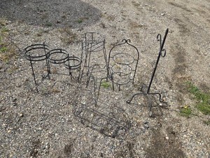 Lot of plant stands and metal racks including various sizes and shapes