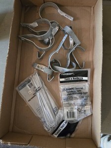 Chain link fence hardware including tension bands and wire ties
