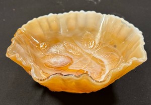 Imperial Glass caramel slag glass bowl featuring an embossed rose pattern and a ruffled edgeOverall excellent condition idk if it the color but I dont see any wear