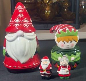 Lot of 4 Xmas Themed Cookie Jar, Candy Jar & a Salt & Pepper shakerLight wear like scratches NO cracks, ms clause missing plug to seal