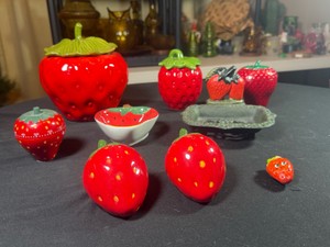 Lot of 9 strawberry House hold items, cookie jar, 2 sugar jars, timer, salt & pepper shakers, Magnet, small bowldish, metal soap trayCookie jars is a Poppytrail pottery by Metlox and the lid has a couple small nicks, light crazing on bowldish��metal 