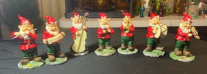 Lot of 7 Gnomes or elves playing instruments made in china numbered 1-7 on the bottom