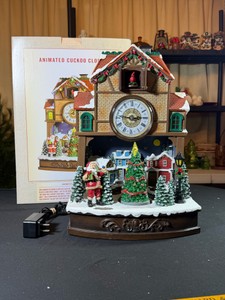 Christmas themed animated cuckoo clockOne of the bottom leg is broke so it slightly leans to the front, the animated feature works when plugged in, trees spins, lights change colors and plays Xmas songs. Other wear is light scratches dirt dust.