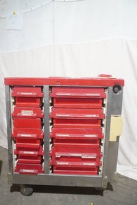 Rolling cabinet with drawers that open from either side 25 x 36 x 42 this was a medical cart in its previous life